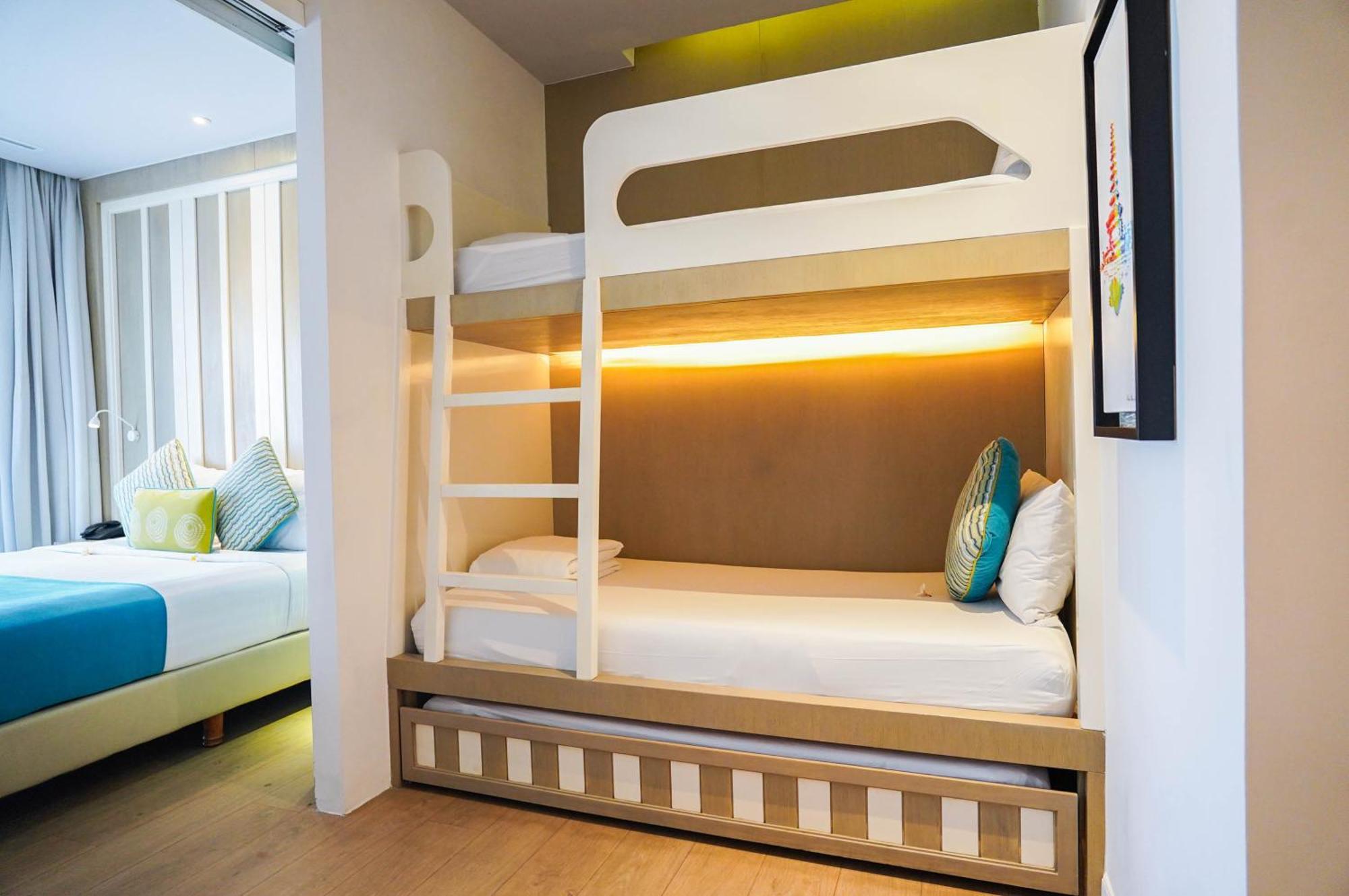 Grand Mirage Resort & Thalasso Bali Nusa Dua  Exterior foto Bunk beds in a hotel room